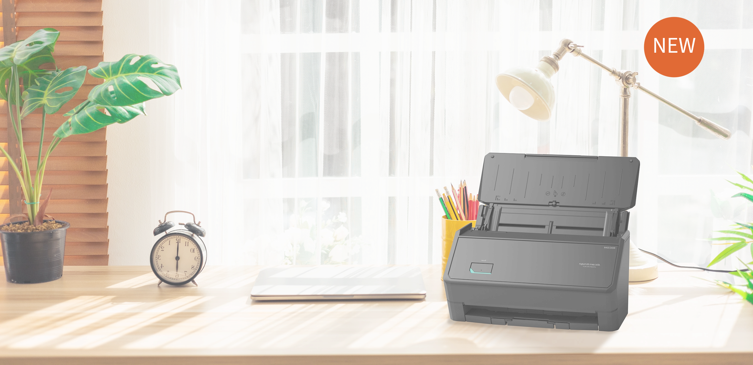 ScanSnap iX2400 black on a desk