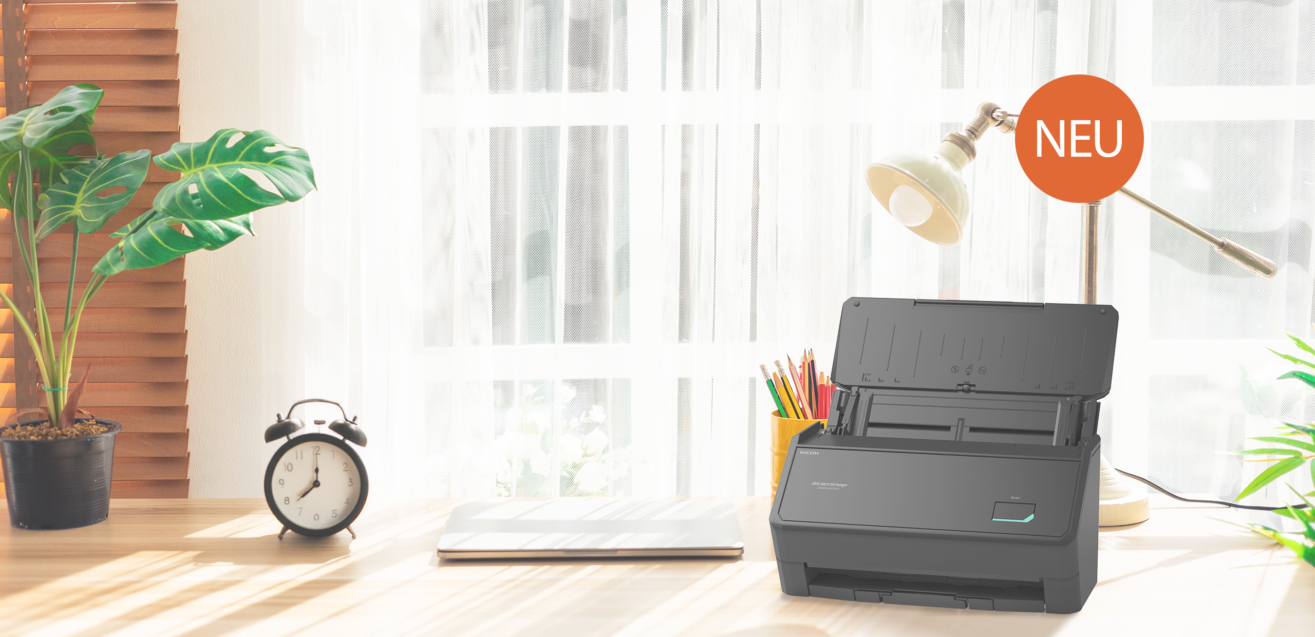 ScanSnap iX2400 black on a desk