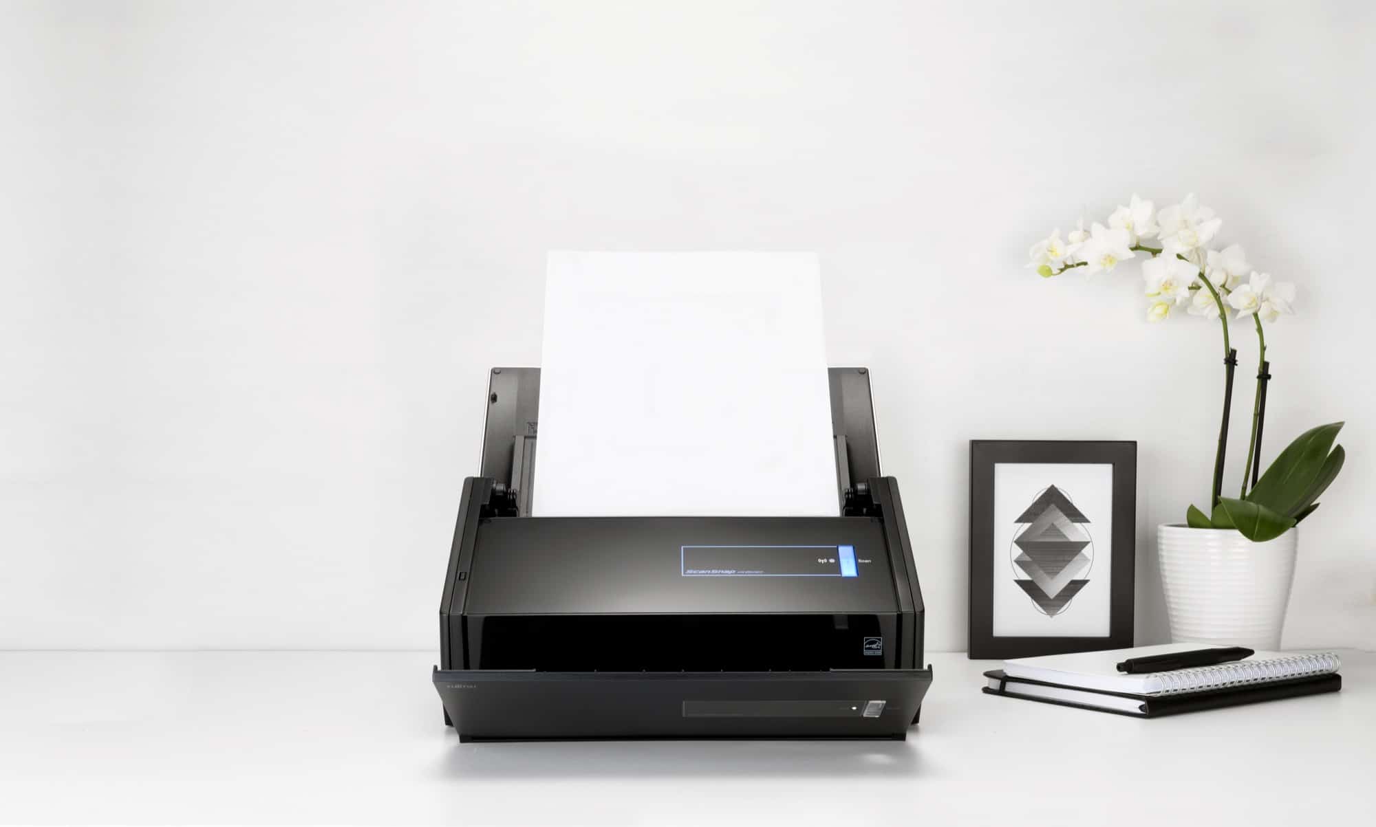 ScanSnap ix500 scanner with paper feeding through at the top