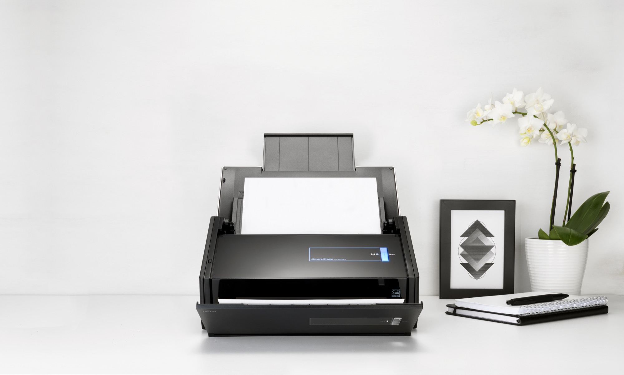 ScanSnap ix500 scanner with paper being scanned through